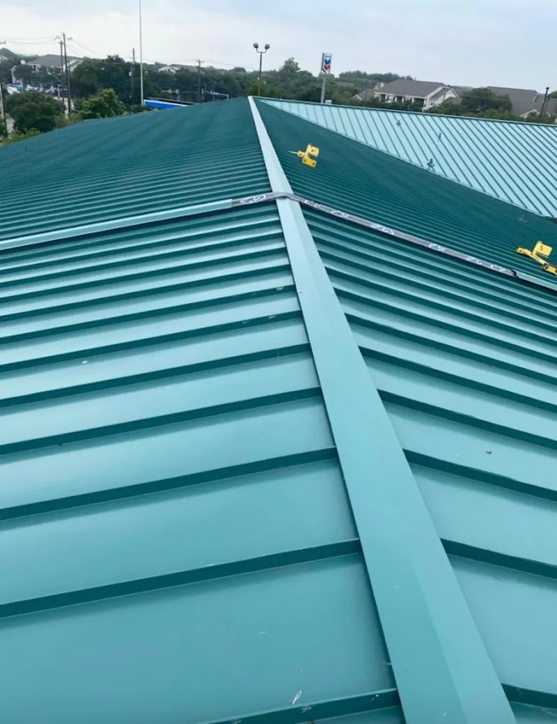 Green commercial metal roof ridge and valley for Metal Roof Repair in O'Hara